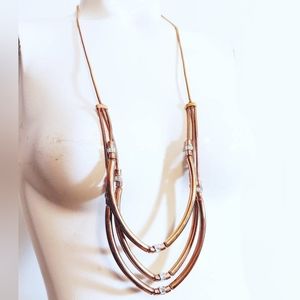 Henri Bendel art deco triple strand gold finish necklace tassle Statement